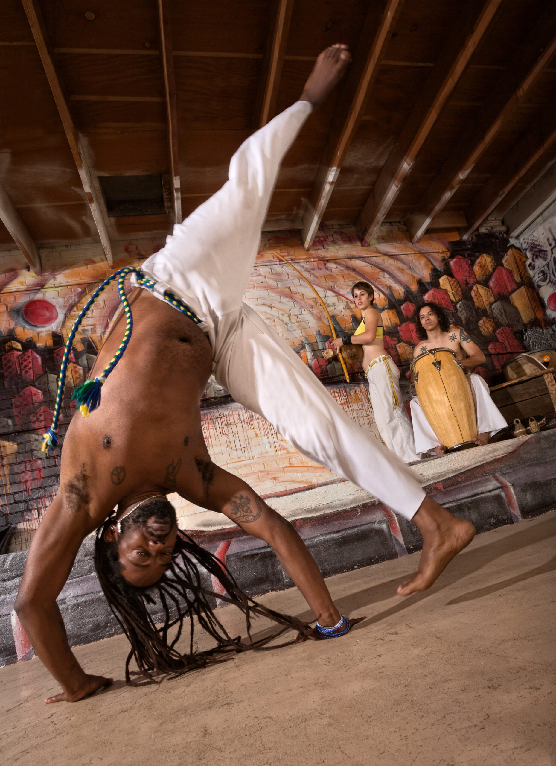 Capoeira student doing an aú cartwheel at Tucson Capoeira – UCA